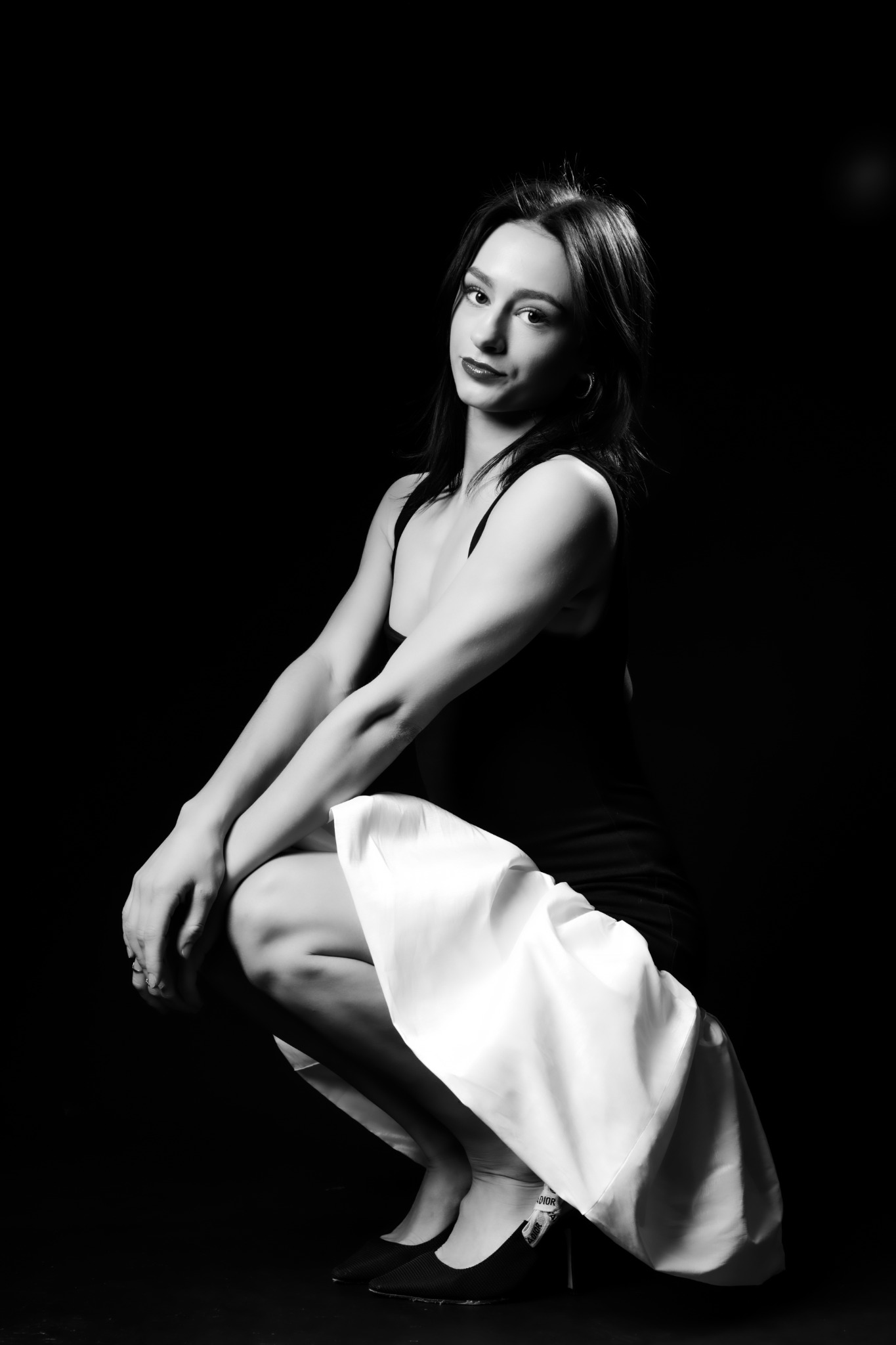 Ava Ziegler in a black-and-white studio portrait